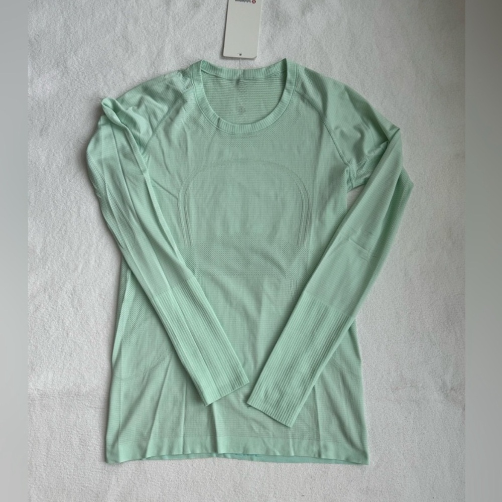 Lululemon Athletica swiftly tech in tidewater teal size 10